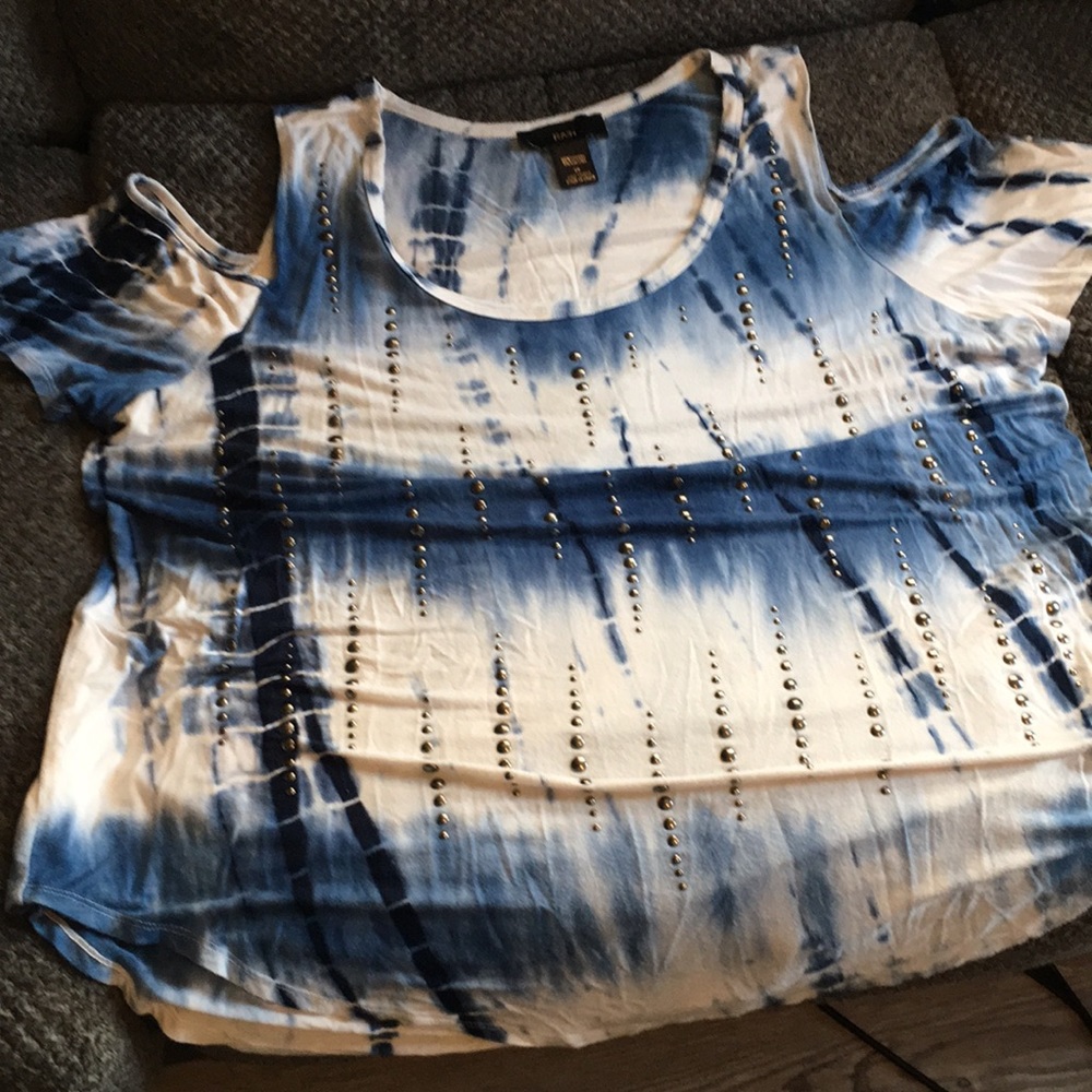 Blue and white tie dyed cold shoulder short sleeve shirt.